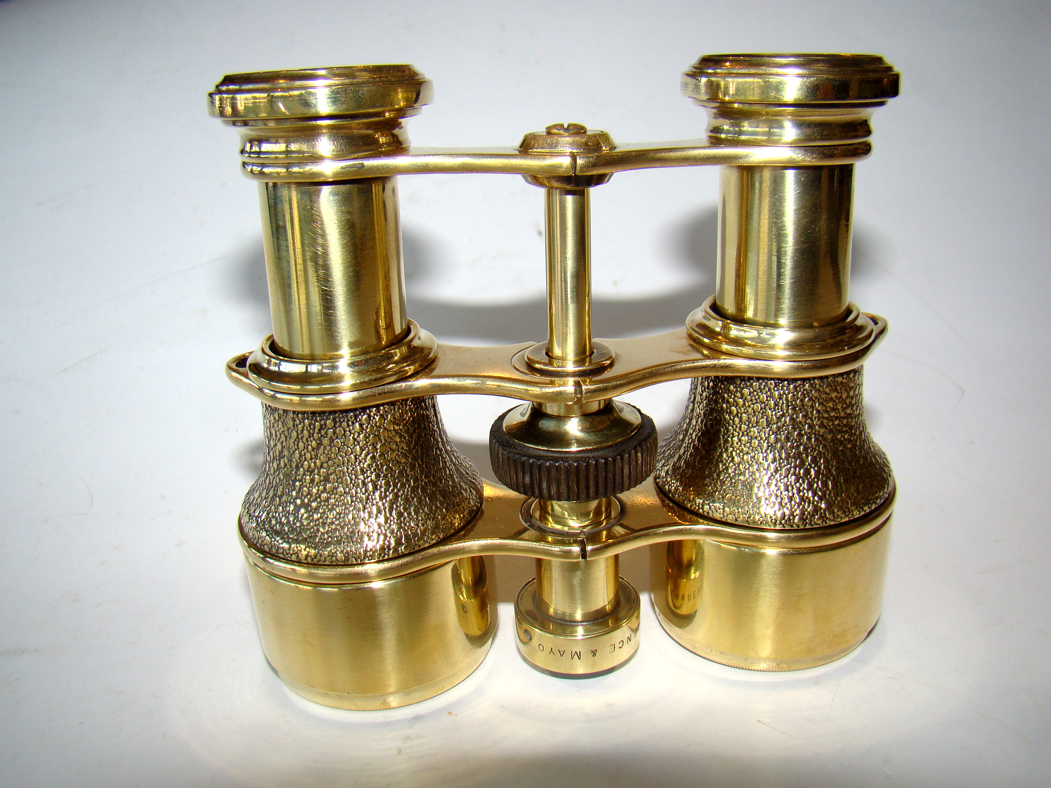 A gorgeous pair of antique English  brass 'field' glasses with built-in compass circa 1870