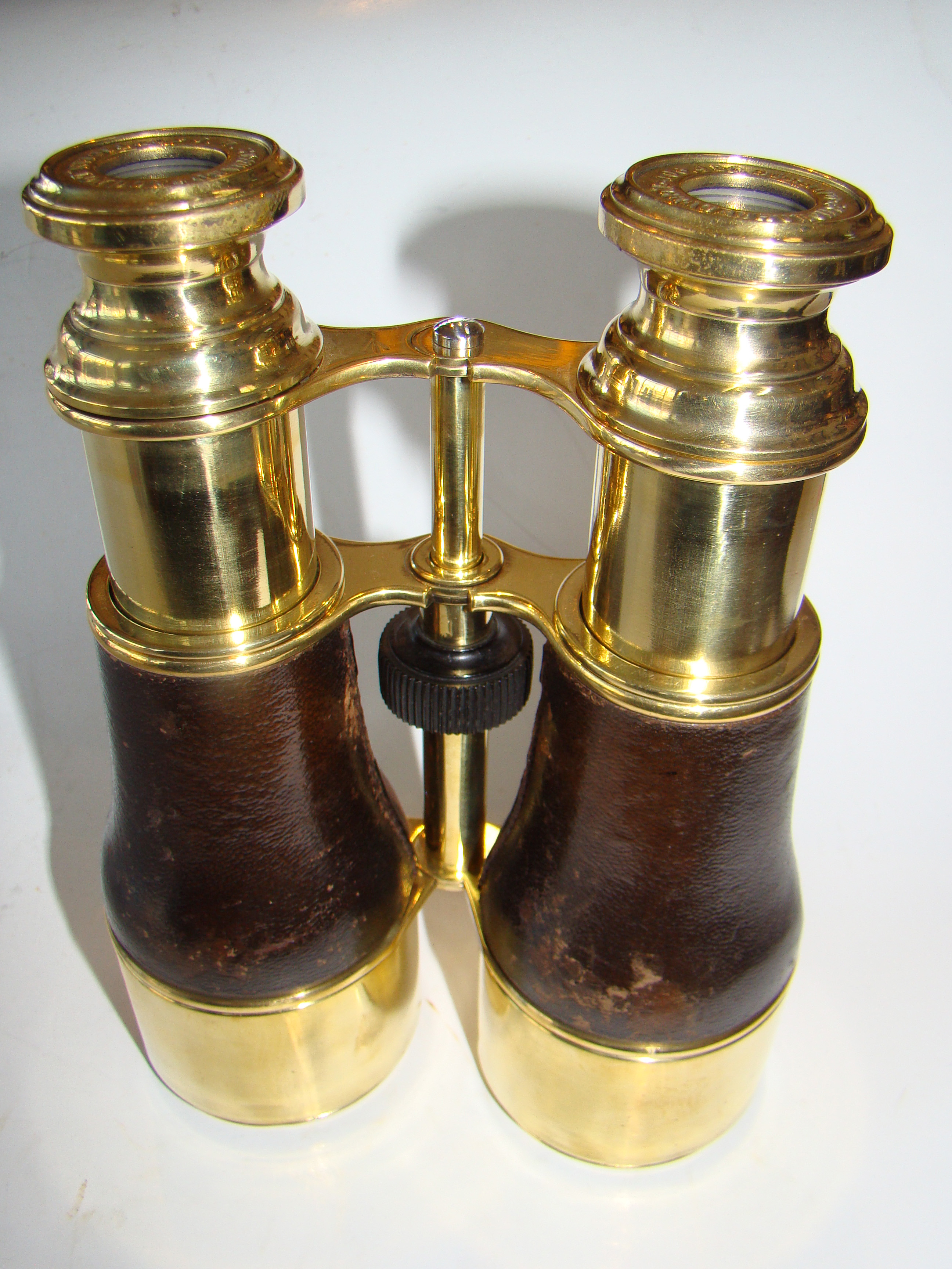 A fine pair of antique British army field glasses by J.H. Steward circa 1900