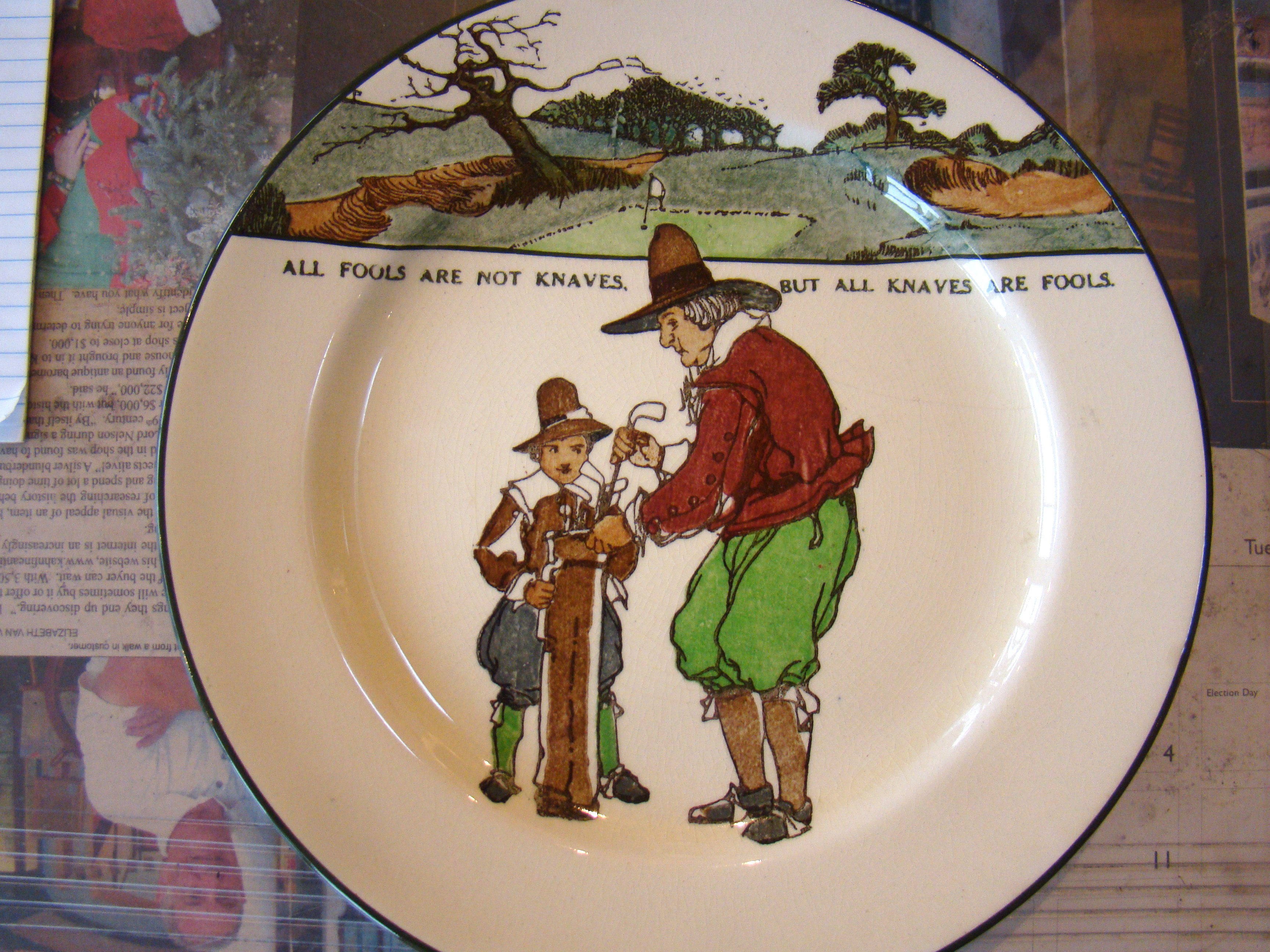 A vintage plate from Royal Doulton's Golfing Series circa 1911-1932