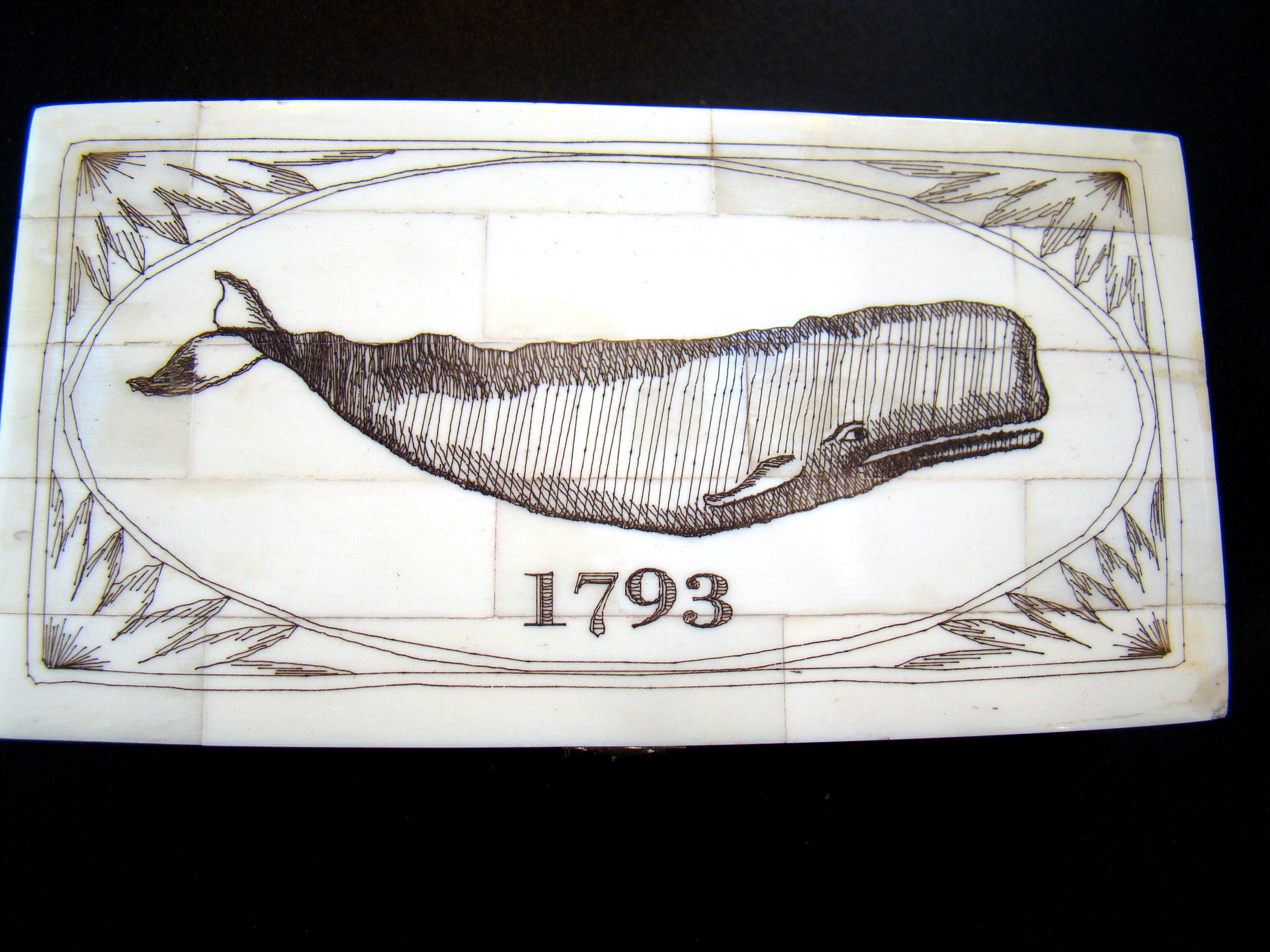 A charming 'faux' scrimshaw box engraved with a whale and dated 1793
