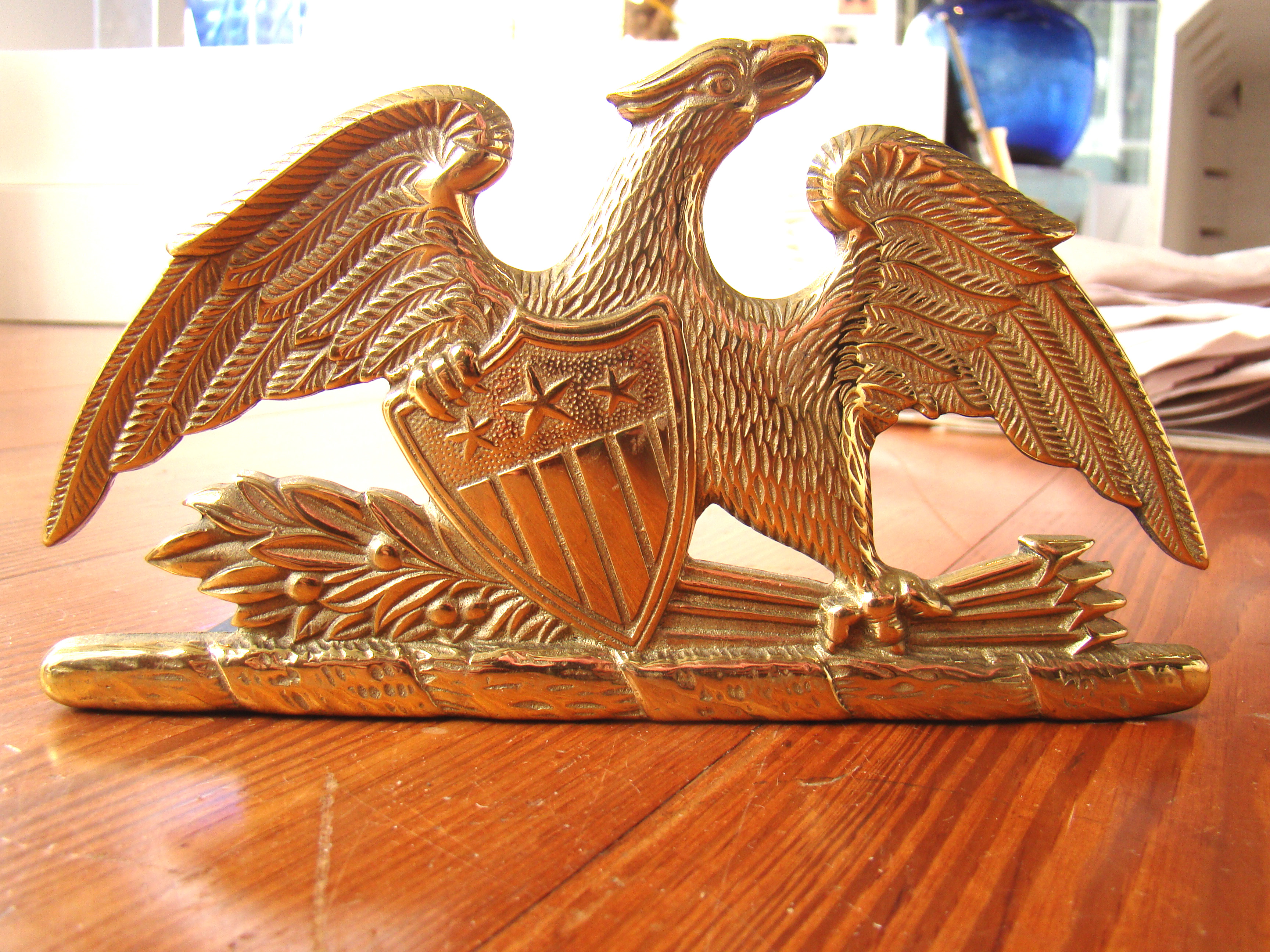 A single brass spread wing American eagle bookend made in 1952