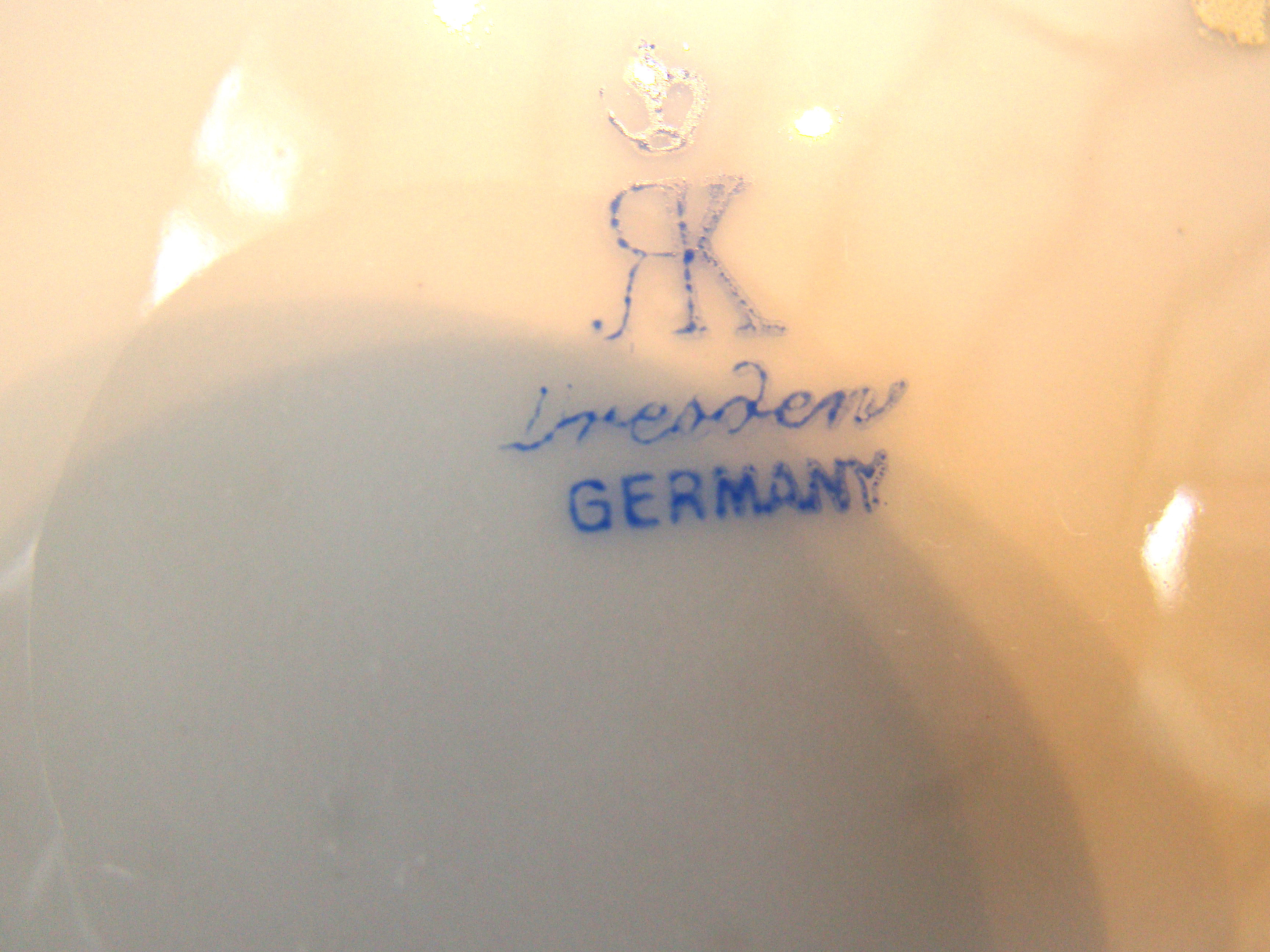 A beautiful set of six hand painted German porcelain plates circa 1900 — image 3