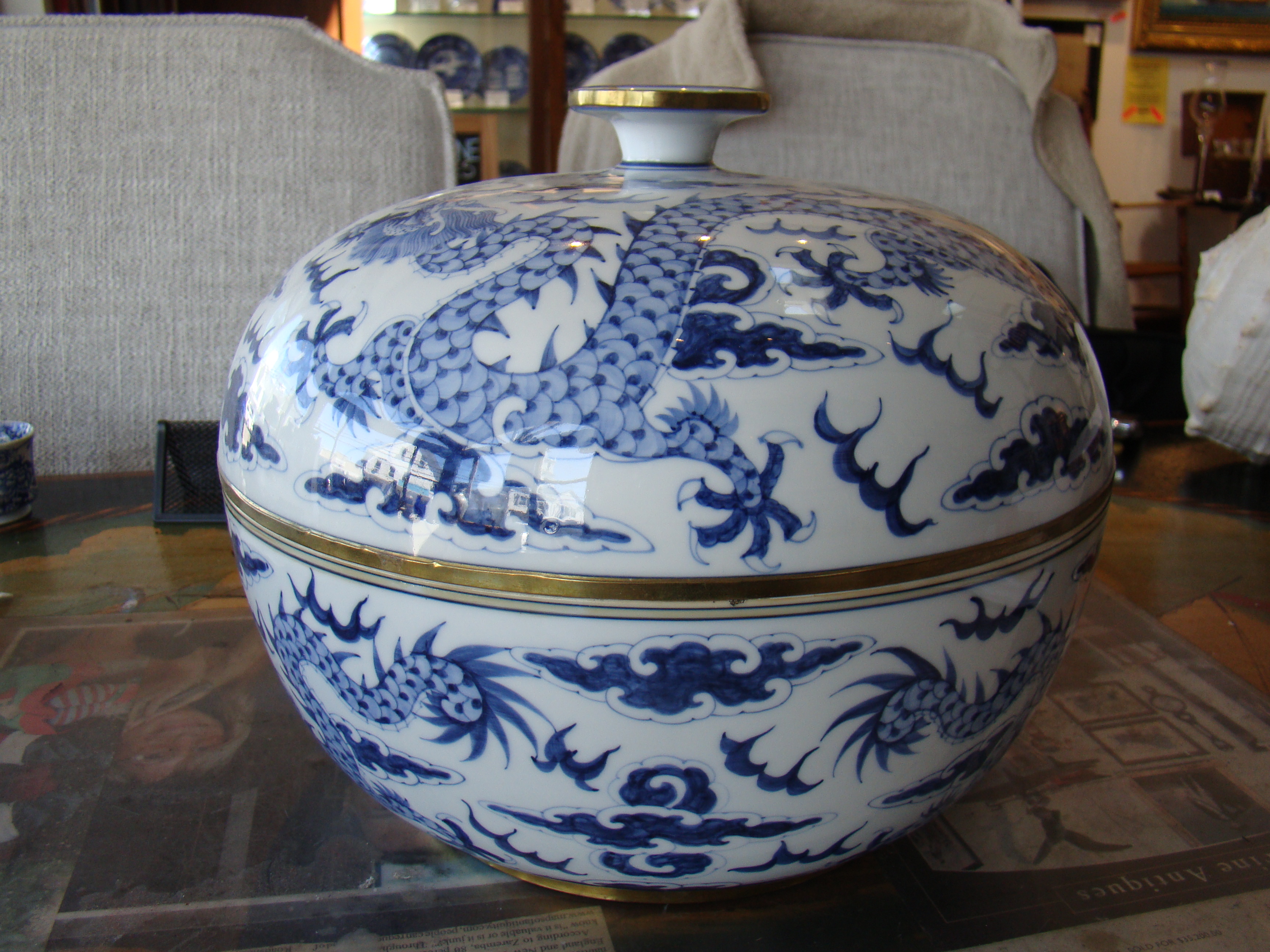 A gorgeous contemporary Asian covered bowl with brass edges