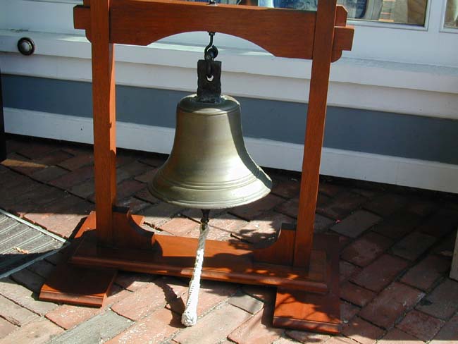A 19th century Bronze Ship's Bell Mounted on a Custom Made Mahogany Stand