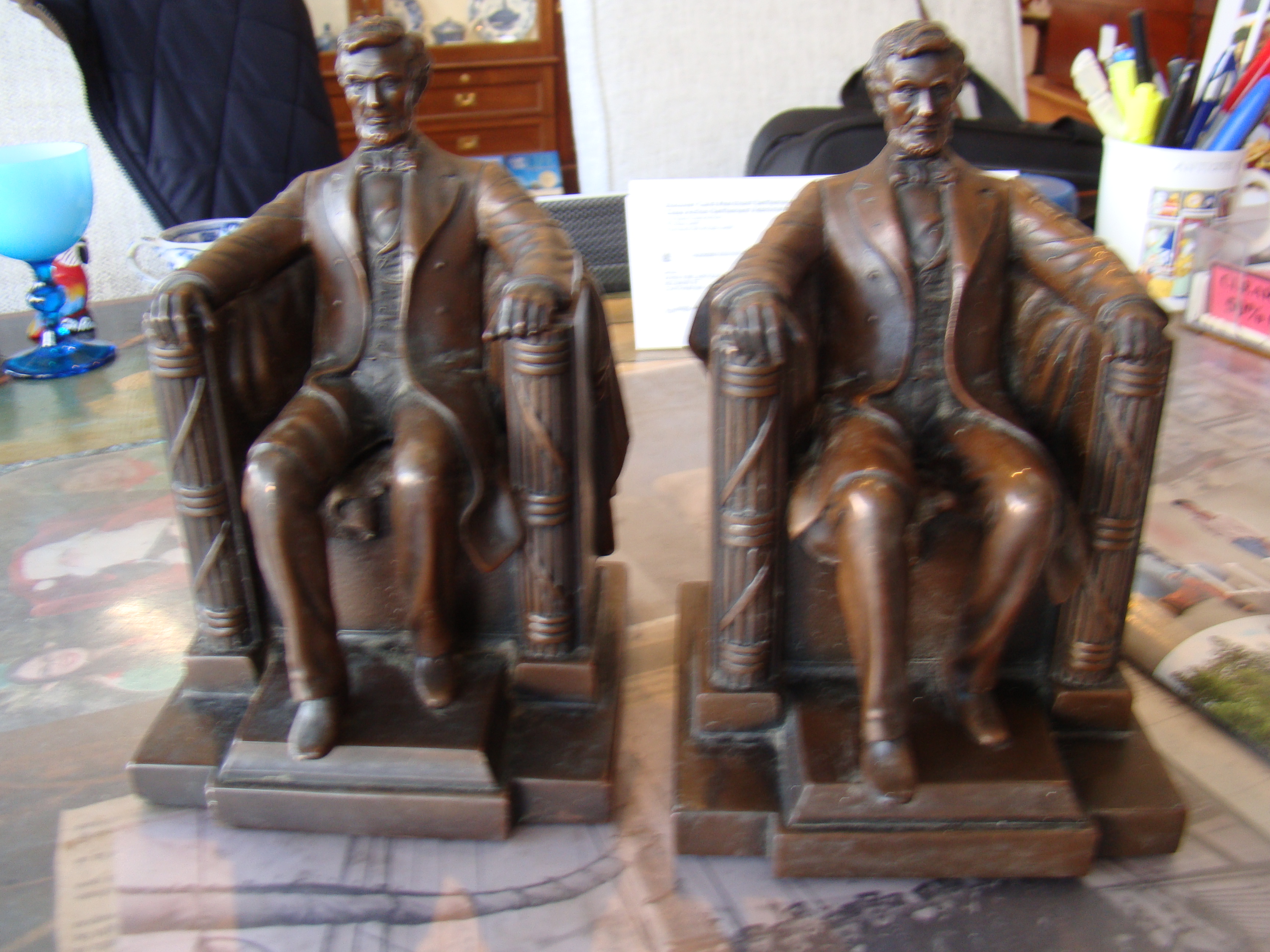 A FABULOUS early pair of Lincoln in the chair bookends made by Jennings Brothers circa 1922-1925