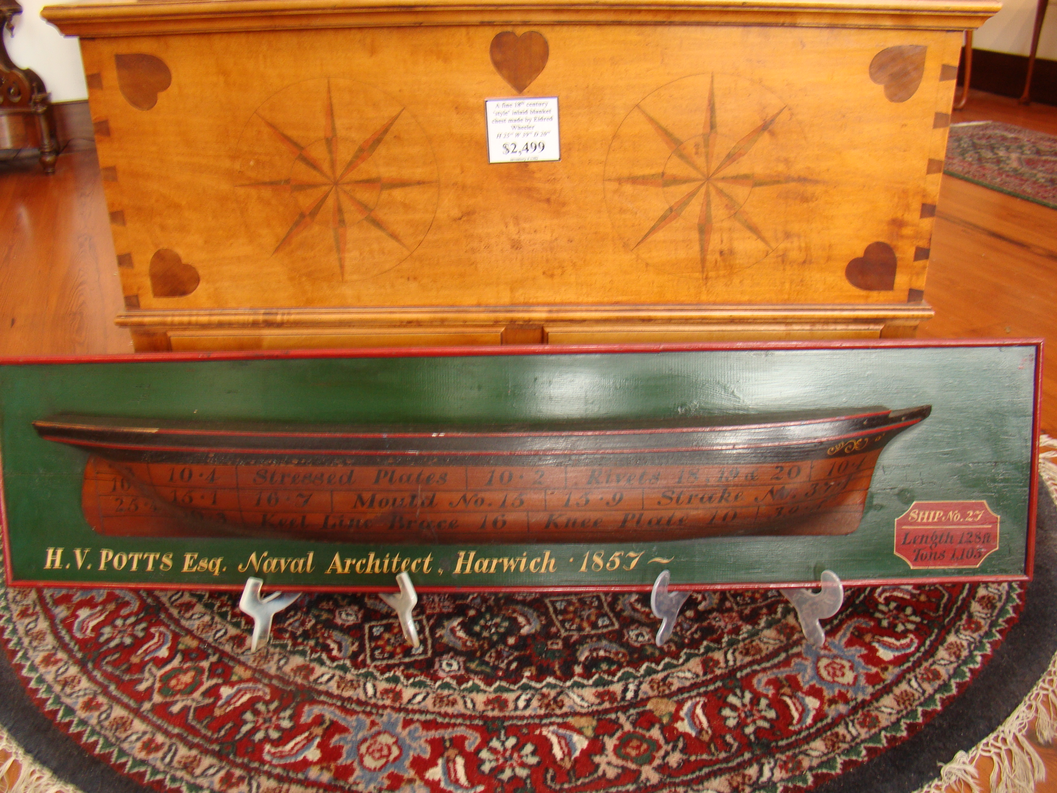 A vintage ship builder's half hull model inscribed "H V Potts, Naval architect, Harwich, MA., 1857"
