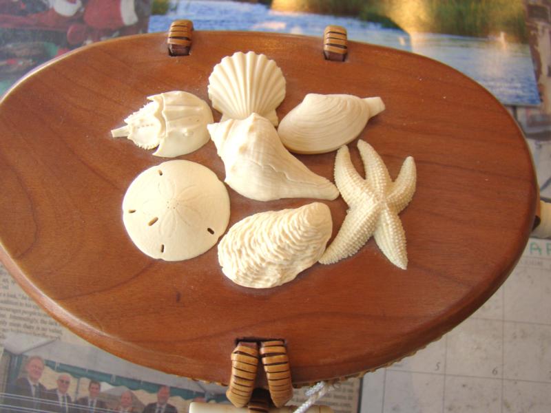 A gorgeous Nantucket basket with seven ivory shells, starfish and crab on the lid — image 2