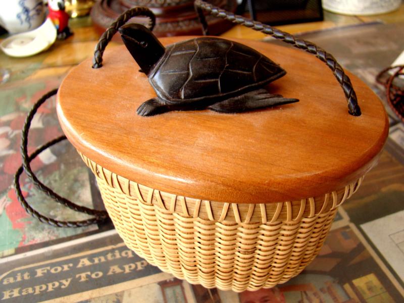 An oval Nantucket basket having a carved ebony  tortoise on the lid — image 2