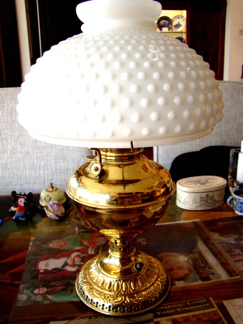 A beautiful antique oil lamp, converted to electricity, dated May 21, 1895 and made by Edward Miller & Co., Meriden, CT