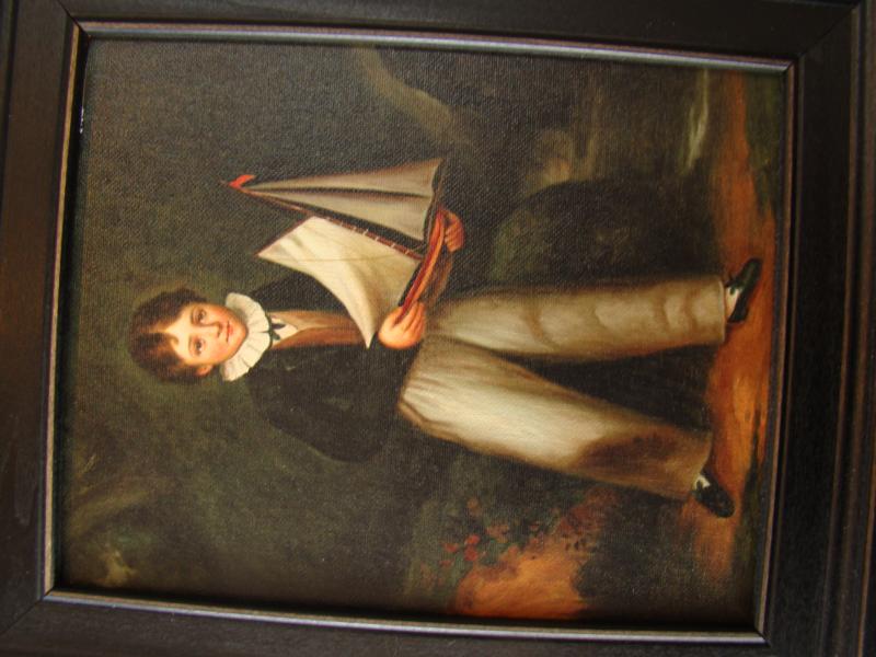 A fine reproduction of a young boy holding a pond boat circa 1880