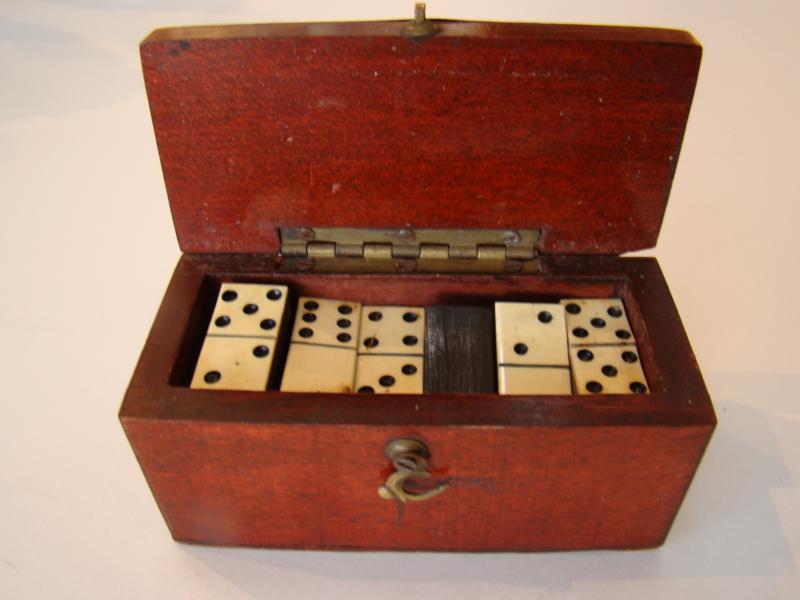 A fine box of dominoes circa 1820 with all 28 bone and ebony pieces — image 2