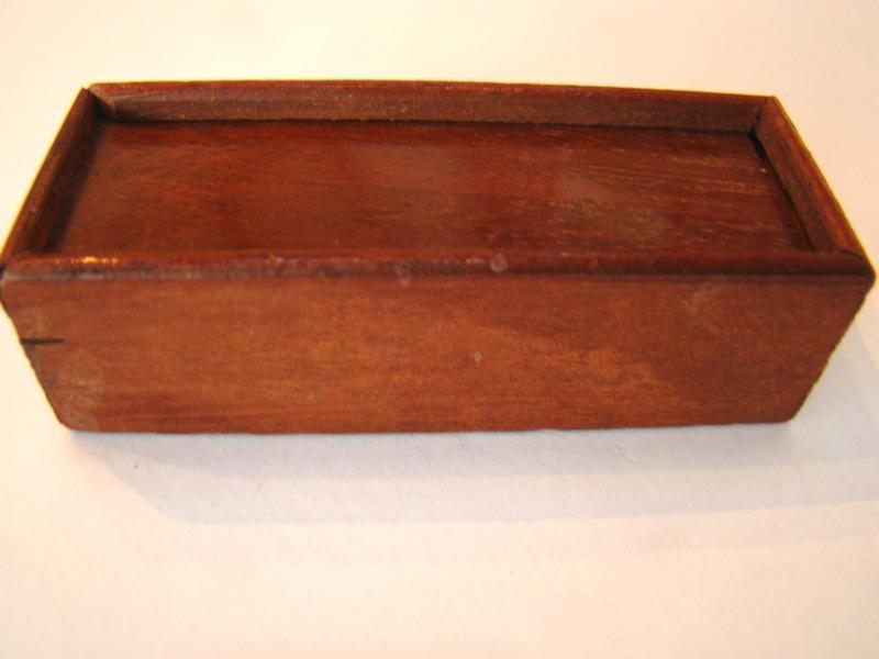 A fine miniature set of dominoes having all 28 bone and ebony pieces circa 1810 — image 2