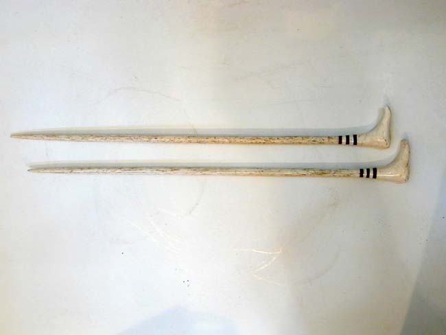 A fine and Rare Pair of 19th century Sailor-Made Whalebone Knitting Needles with Feet Ends — image 2