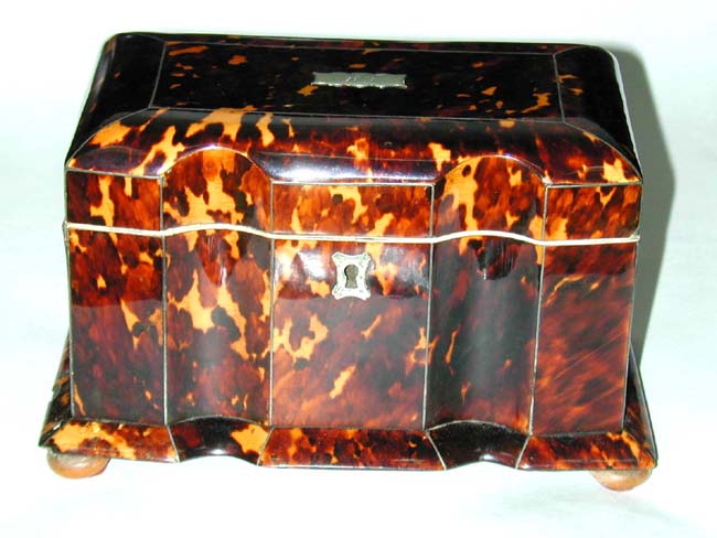 An English Regency Period Tortoiseshell and Ivory Tea Caddy circa 1810.