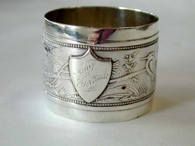 An antique American Sterling Silver Napkin Ring with the name "Amy Gertrude" circa 1900