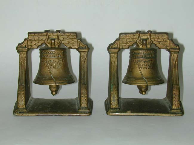 An Antique Pair of 'Liberty Bell' Cast Iron Bookends circa 1910-1920