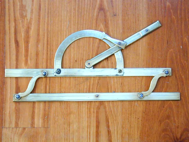 An antique Brass Navigational Instrument Combining a Parallel Ruler, Protractor and Vernier Scale