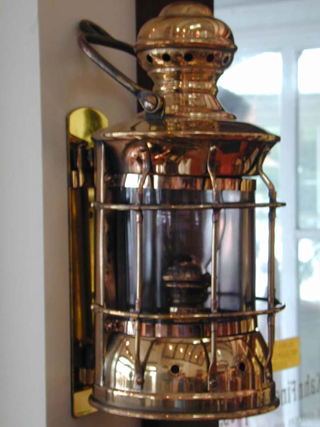 A fine 19th century Ships Passageway Lamp with Its' Original Wall Mounting Bracket