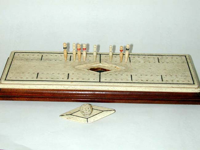 A 19th century Sailor-Made Whalebone Cribbage Board