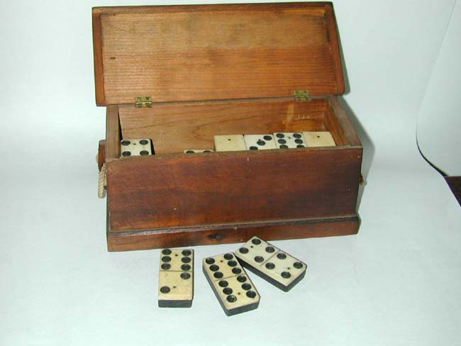 A Fine Set of 19th century Bone and Ebony Dominoes housed in a Miniature Seamen's Chest
