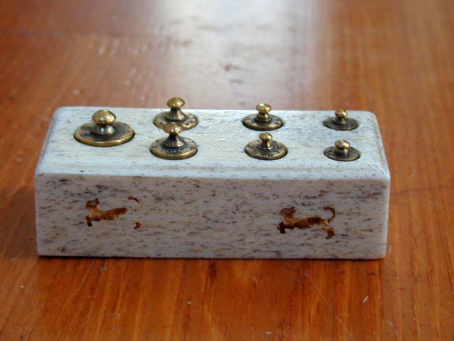 A Set of 19th century Brass Weights set into a Whalebone Stand — image 2