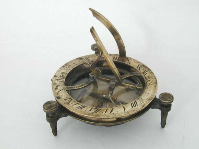 An Early 19th century English Brass Combination Compass and Sundial Signed 'William Gilbert & Sons, London.'