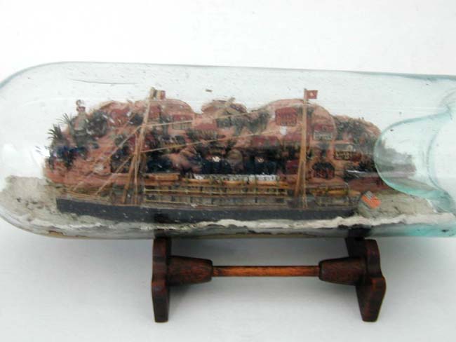 A Rare Late 19th century American Auxiliary Steam and Sail Ship in a Bottle with Village Background — image 2
