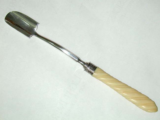 An Antique English Silver Plated Cheese Scoop With Bone Handle Circa 1860