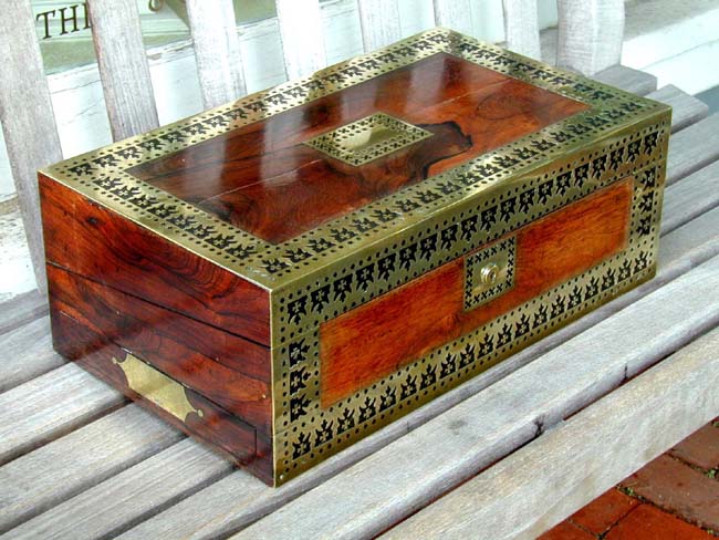An English Regency Period Rosewood Writing Box With Decorative Pierced Brass Banding Circa 1820