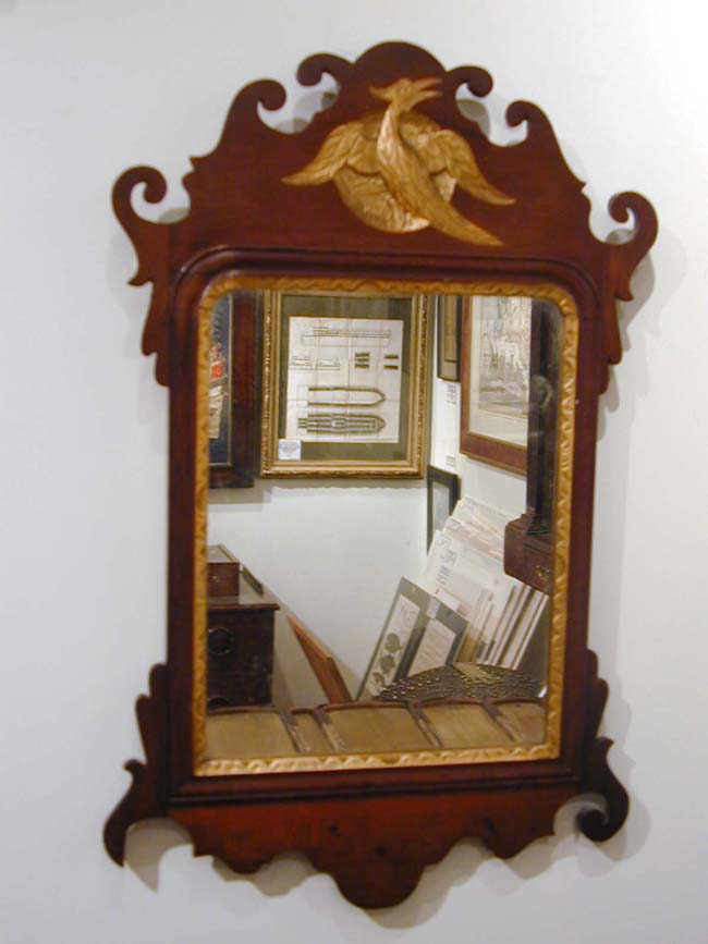 A Late 18th Century American Chippendale Parcel-Gilt Mirror with Carved Phoenix Roundel